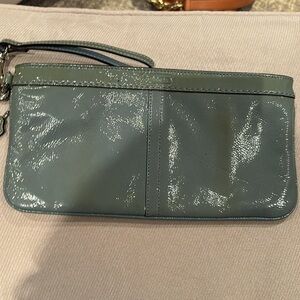 Coach mid green light khaki patent leather large wristlet w/ light blue accents